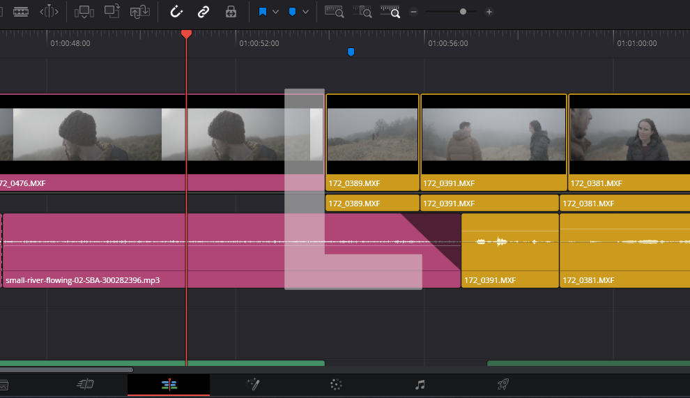  An example of an L cut on an editing timeline, with a semi-transparent L overlaid for visibility.