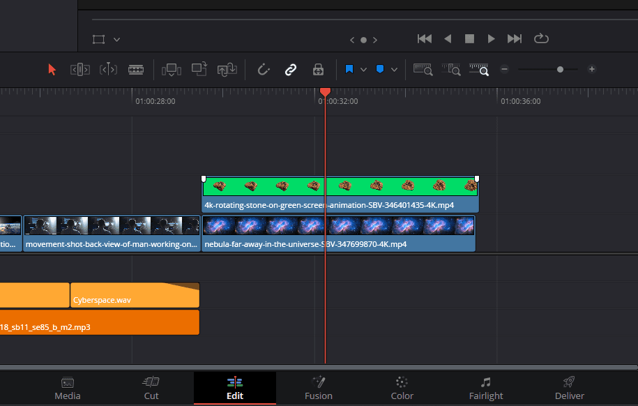 Screenshot of a green screen clip placed on track 2 and a background clip placed on track 1 in DaVinci Resolve.