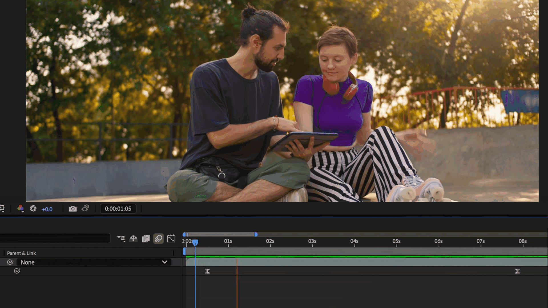 Animation showing where to set scale keyframes on a timeline in After Effects to achieve a standard zoom effect.